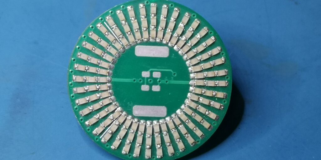 Hand-soldered PCB containing diodes in a fan array